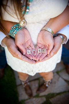 love spelled with scrabble letters and engagement ring picture