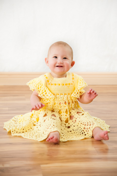 adorable baby girl in yellow dress studio pic durango