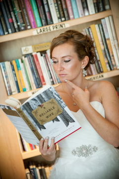 bride reading reliable wife book at library durango co photo