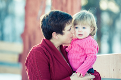 mom daughter portrait snow red barn ranch pagosa springs