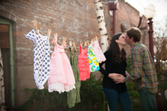 maternity photo baby girls clothesline kissing couple pic durango co