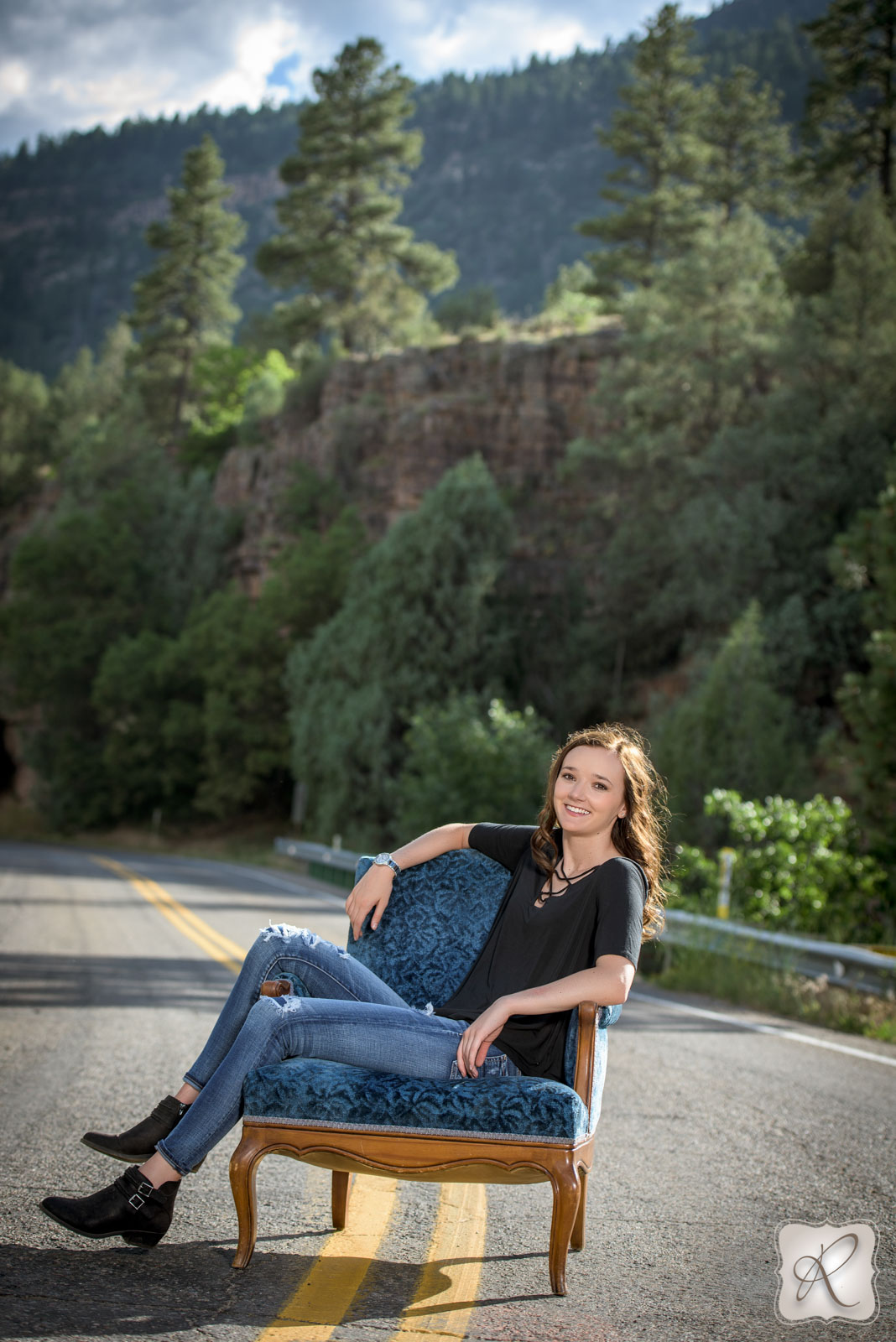 Senior portraits in Durango, Colorado - lounging in a chair