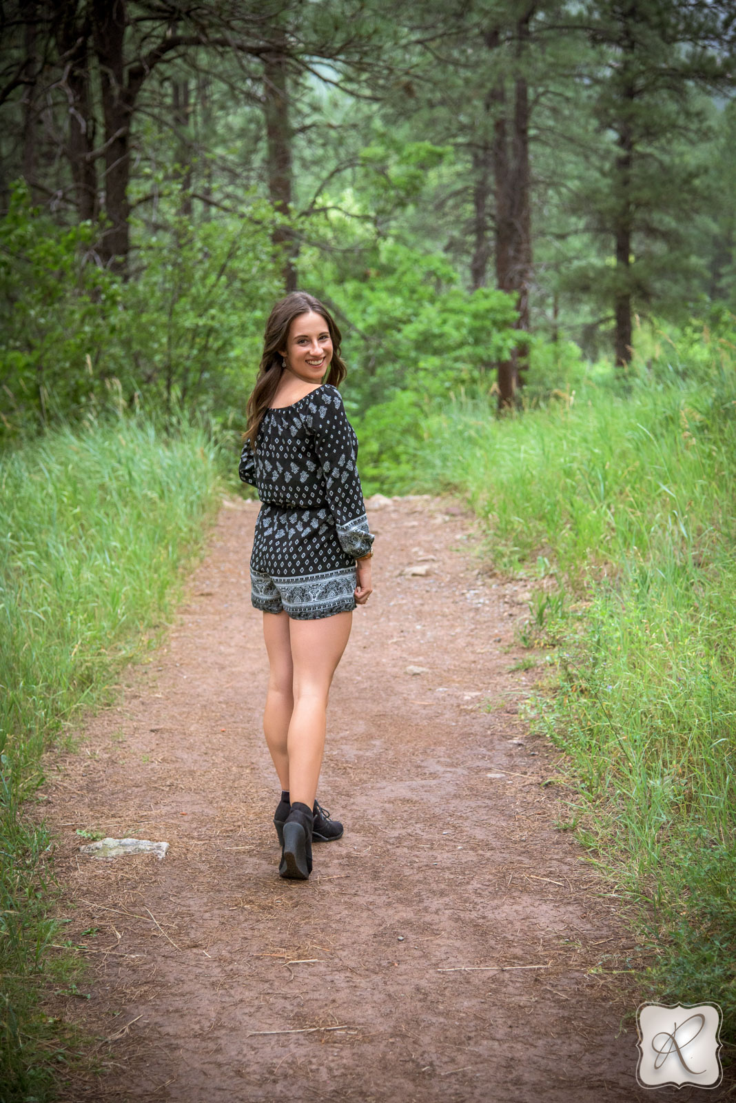 Bella Sage's Senior Pictures - walking in the woods