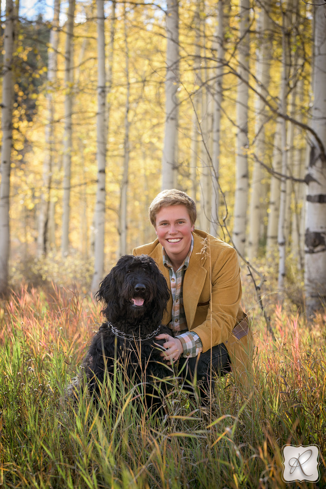 Professional senior portraits with dogs Durango Colorado 