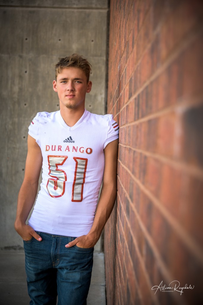 Football senior pictures of senior, Colby Basye, of DHS