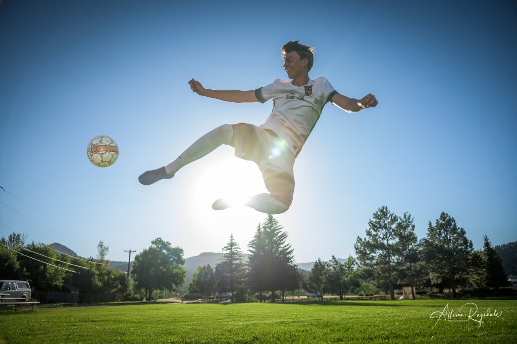 Amazing senior portraits with soccer player in Durango Colorado in morning