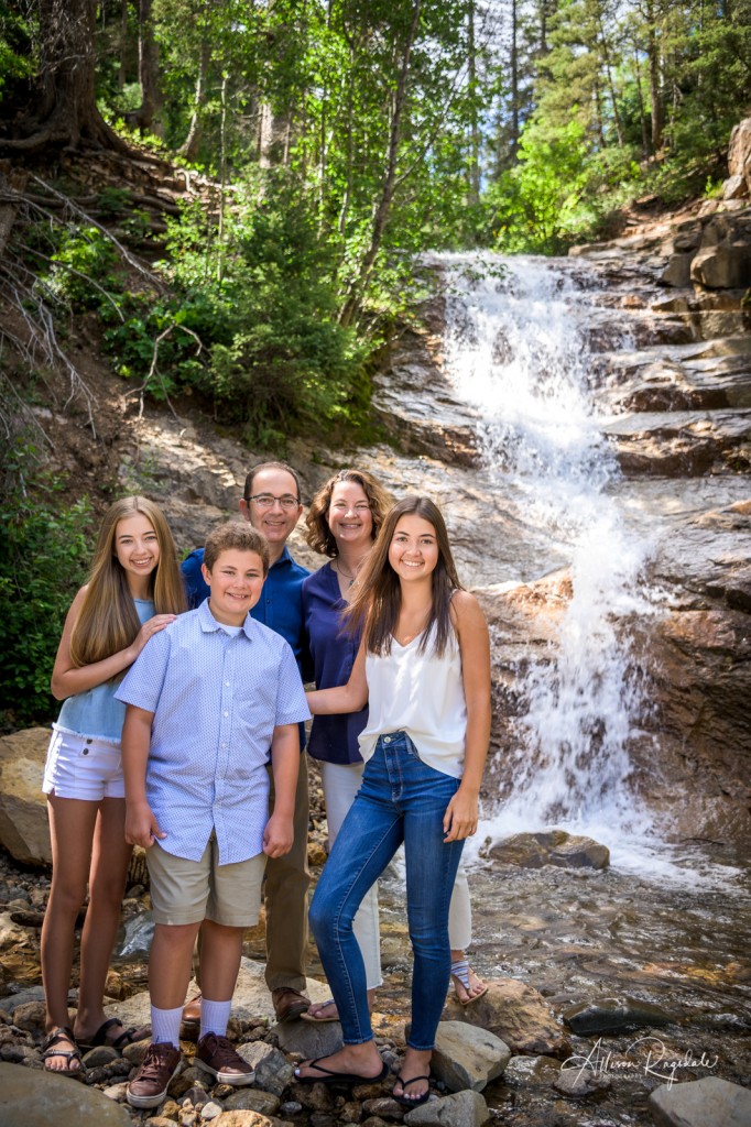 Family photos with waterfall in Colorado