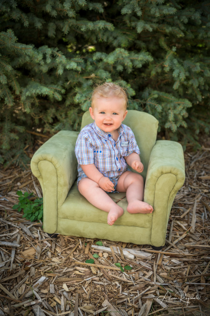 Baby in cute green chair