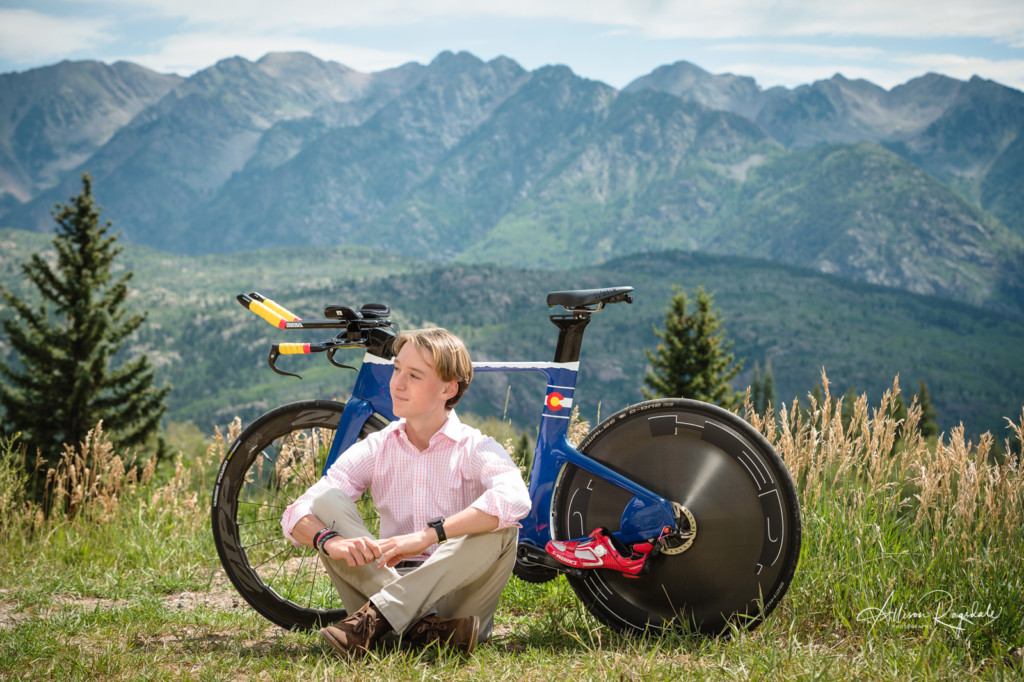 Boy sitting next to his bike taken by Allison Ragsdale Photography in Durango Colorado