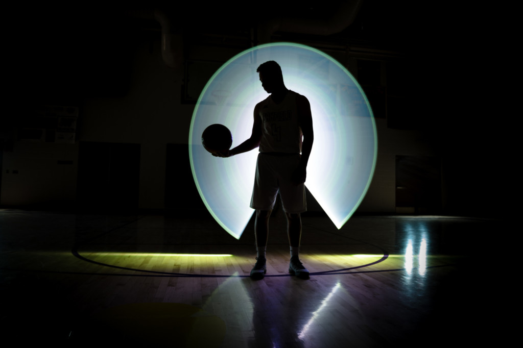 senior guy basketball silhouette with light painting