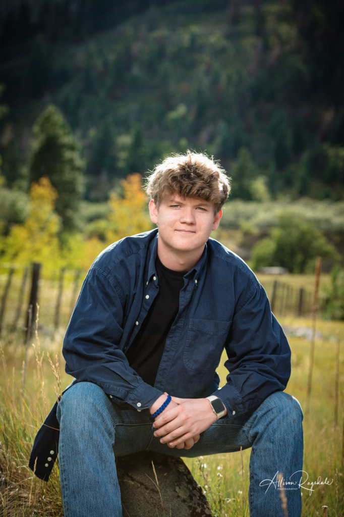 senior picture guy on rock fall colors durango co