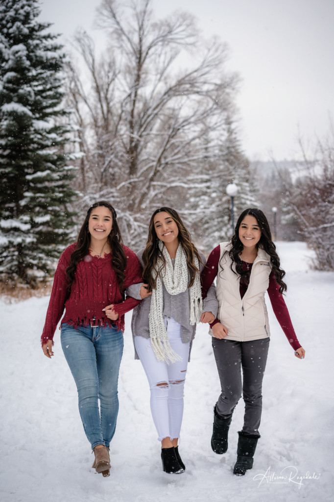 sisters walking in snow river trail durango co photo