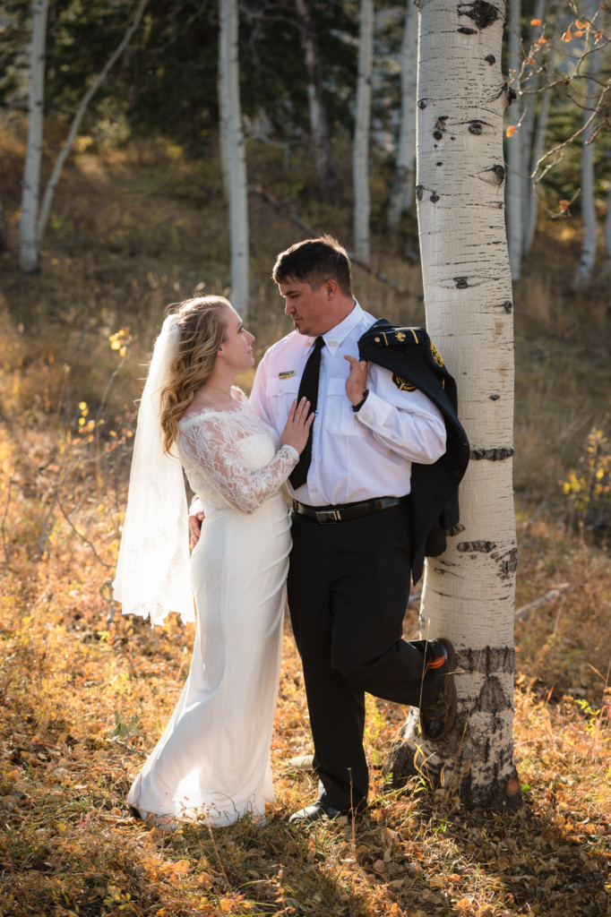 bride and groom in aspen trees elopement picture