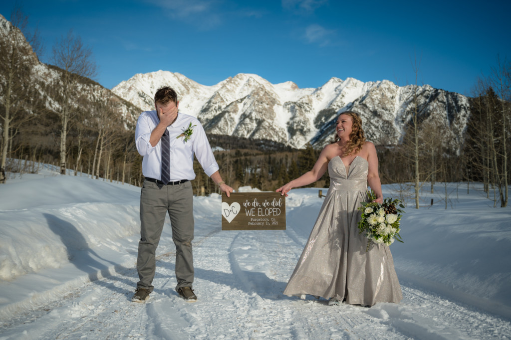 funny picture of bride and groom elopement colorado mountains