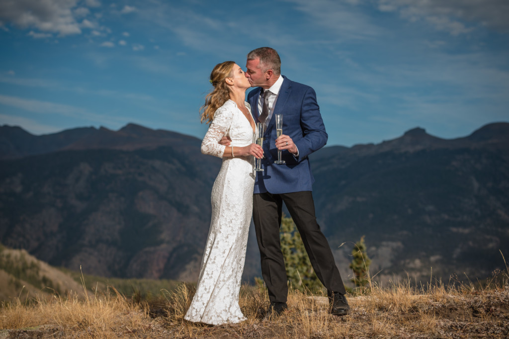 bride and groom champagne toast kiss portrait durango mountains