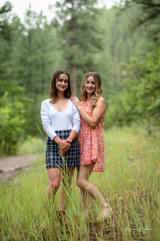 sisters in the forest senior pic