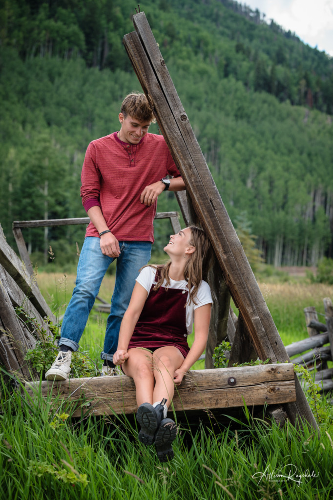 sibling photo rustic colorado cattle chute
