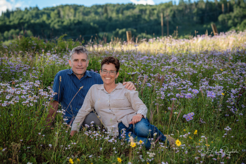 mom and dad in wildflowers colorado family photo