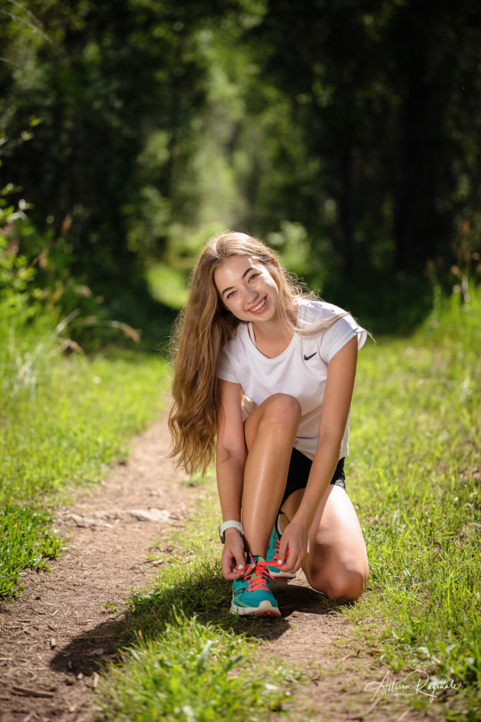 senior girl tying shoe running picture
