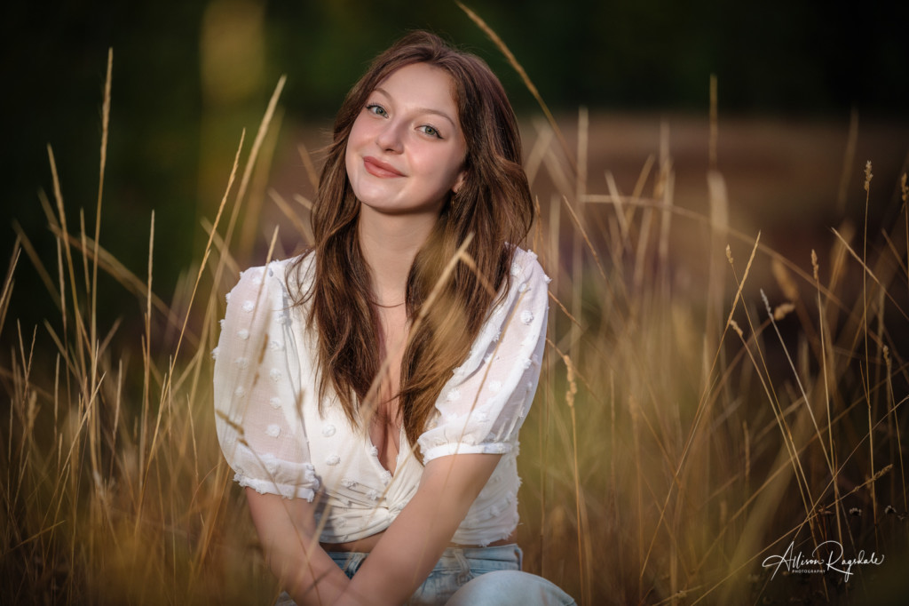 senior girl in long grass photo