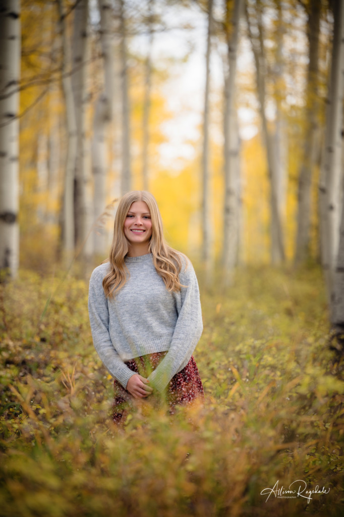 senior picture girl in gray sweater in fall aspen grove
