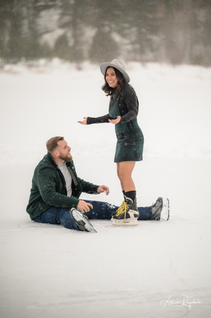 engagement session falling on ice skates picture